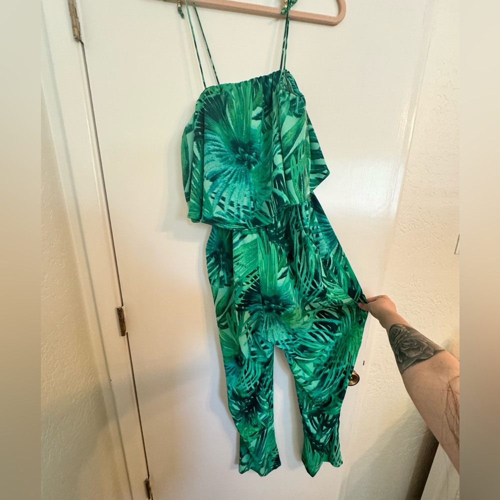 Bold elements cut to curve Tropical jumpsuit